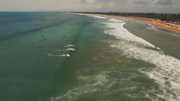 Aerial View Beautiful Beach with Surfers Bali Kuta