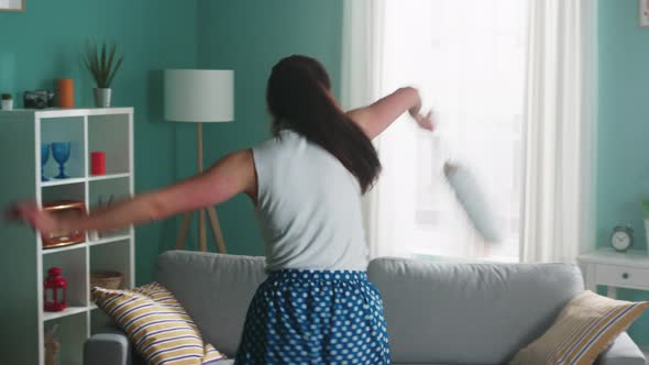 Housewife Is Dancing with Cleaning Brush