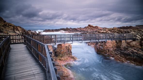 Time Lapse in the south of Western Australia, Yallingup. The Ocean cascading in under a bridge.