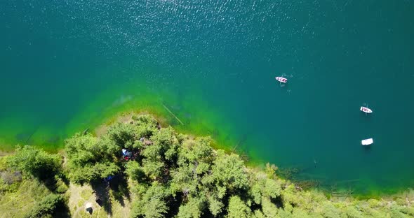 Kolsay Lake Among Green Hills and Mountains