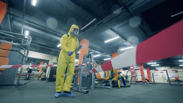 Disinfector Cleans Gym During Coronavirus Pandemic