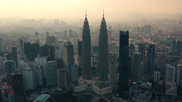Kuala Lumpur city skyline on sunrise in Malaysia.