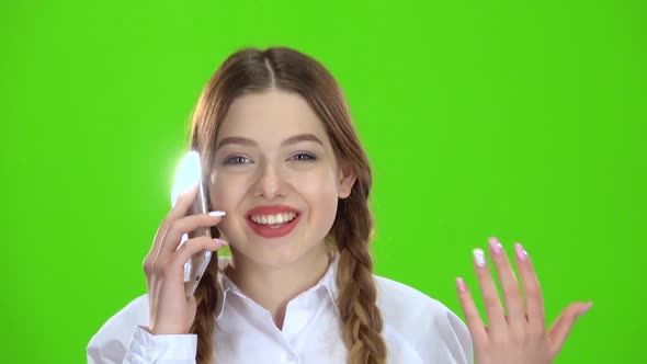 Teen Is Talking on the Phone . Green Screen