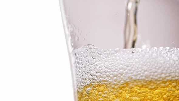 Beer Slowly Pours Into a Glass Slow Motion