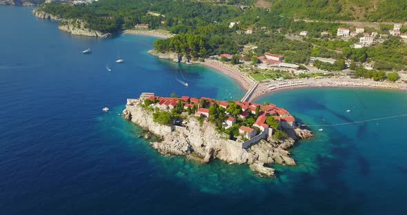 Aerial drone view of town village of semi island Sveti Stefan in Montenegro.