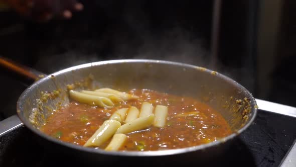 putting the pasta in boiled vegetable gravy