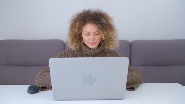 Freelancer writer female working on modern laptop computer at home during lockdown in 4k footage
