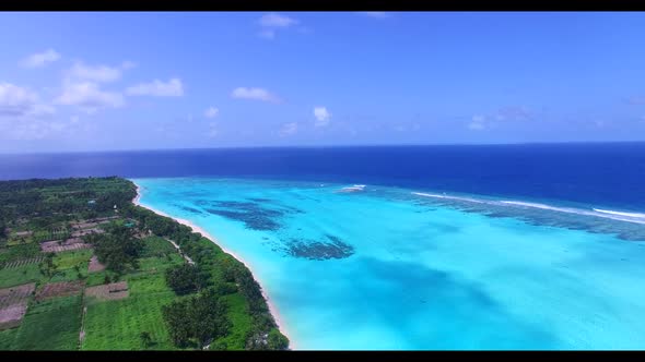 Aerial nature of marine seashore beach holiday by blue ocean with white sandy background of a dayout