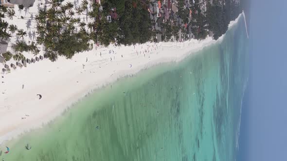 Vertical Video of the Ocean Near the Coast of Zanzibar Tanzania Aerial View