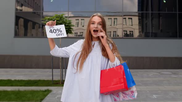 Cheerful Girl Showing Up To 40 Percent Off Text Advertisement. Online Shopping with Low Prices