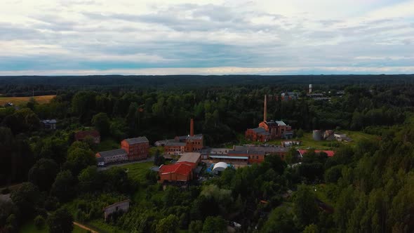 Old Ligatne Paper Mill Village From Above in Ligatne, Latvia. Aerial Dron Shot 4K Video