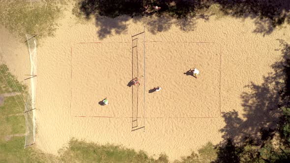 No players identified in action during to plaing Volleyball. Aerial shot