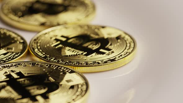 Rotating shot of Bitcoins (digital cryptocurrency) - BITCOIN 0132
