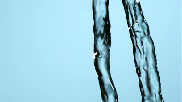 Water pouring and splashing in ultra slow motion 1500fps on a reflective surface - WATER POURS 191