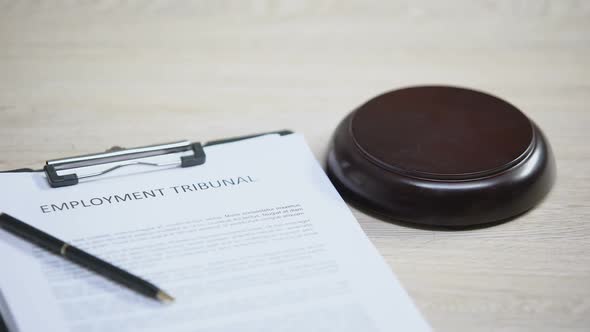 Employment Tribunal Document on Table