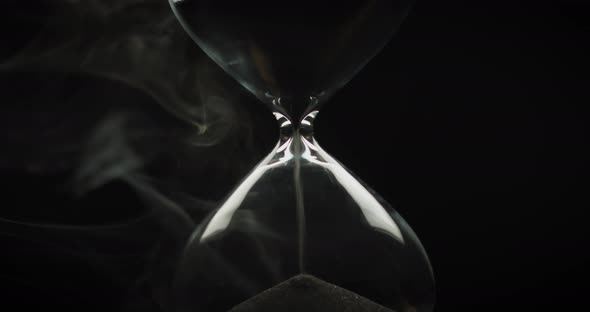 Beautiful smoke surrounding an hourglass