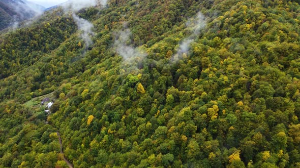 Clouds On The Autumn Mountain Slope