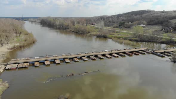  Aerial View on the Pontoon Bridge Across the River.