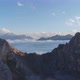 Aerial Shot of Caucasus Mountain Peaks Above Clouds at Sunset - VideoHive Item for Sale