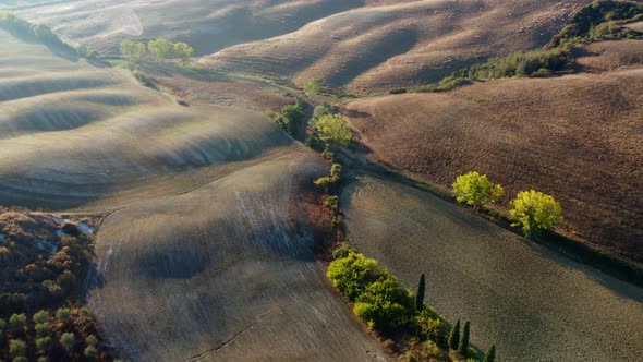 Countryside in Val d'Orcia Tuscany Aerial View at Sunrise