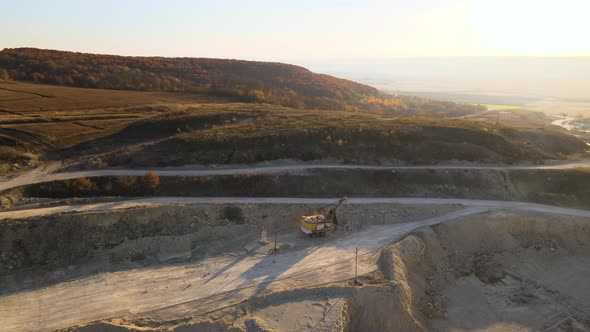 Aerial View of Open Pit Mine of Sandstone Materials for Construction Industry with Excavators and