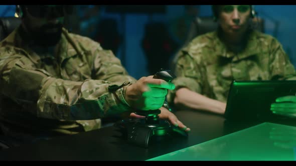 Soldier Using Remote Controlling Device