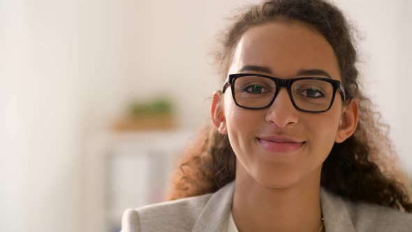 Face of Smiling African American Woman in Glasses