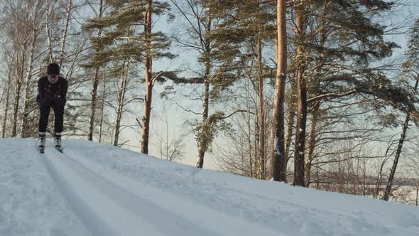 Woman Skiing Down Hill