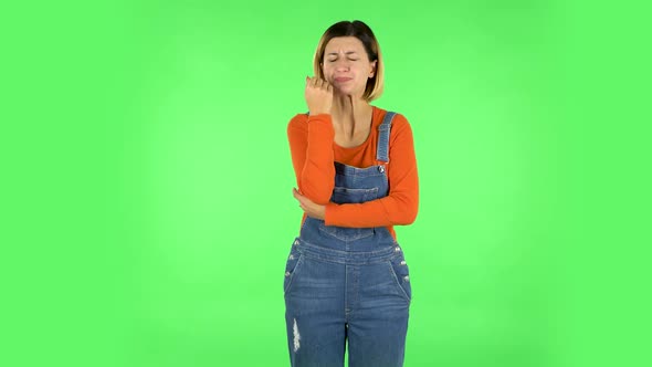 Girl Got a Cold, Sore Throat and Head, Cough on Green Screen at Studio