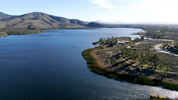 Aerial View of Otay Lake Reservoir with Blue Sky and Mountain