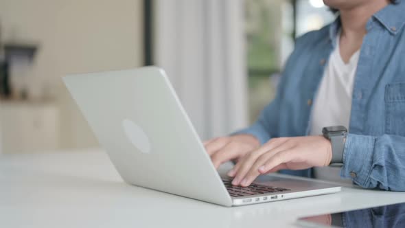 Close Up of Male Hand Opening and Typing on Laptop