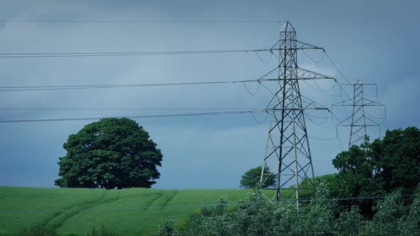 Electricity Pylons In Windy Countryside