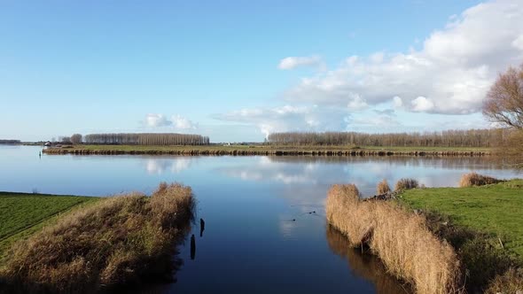 Aerial drone footage of the tidal river Het Spui in Holland  with calm and clear weather.