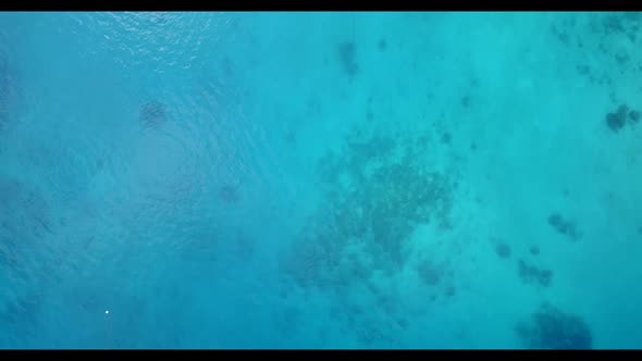 Aerial drone view texture of relaxing resort beach adventure by blue ocean and white sandy backgroun