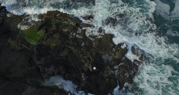 Flying over Historical Old Castle and Big Waves