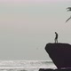 Seascape with Alone Man on Rock - VideoHive Item for Sale