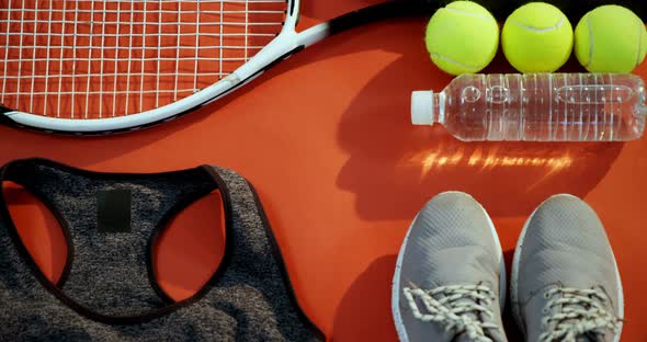 Water bottle, sports shoes and sports equipment in studio 4k