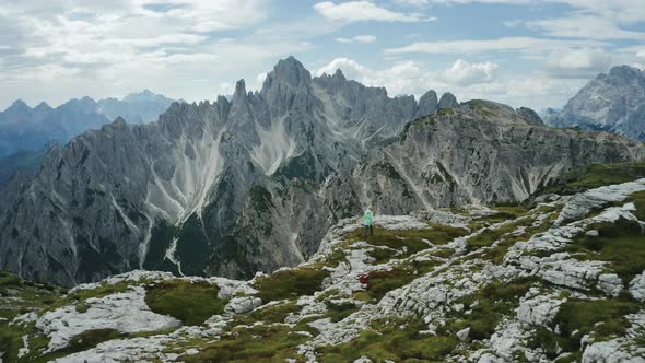 Aerial View of Women Hiking Close to Auronzo Di Cadore of Cadini Di Misurina Mountains Group in