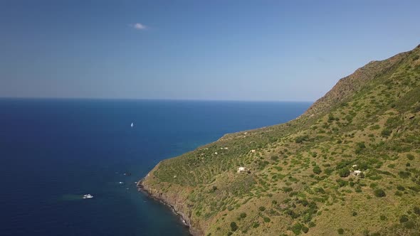 Aerial View on Anchored Vessels and Mountain of Lipari Island. Mediterranean Sea. Blue Sky, Horizon