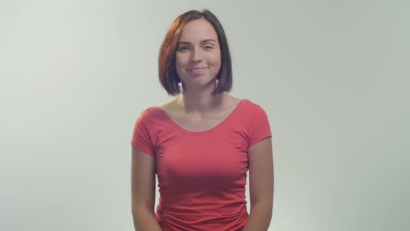 Young woman approving with her head