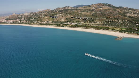 Aerial view of the coast of Roccella Ionica in summer