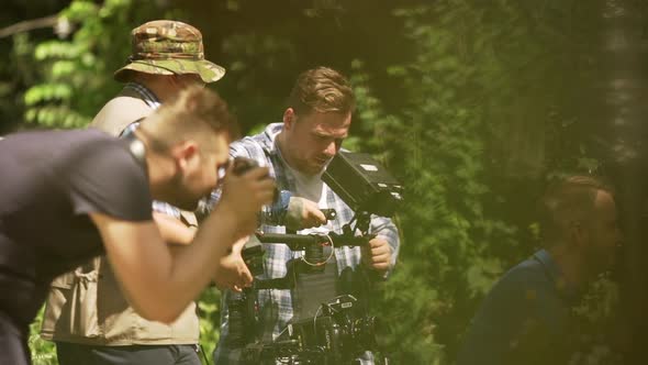 ODESSAUKRAINE 06212017 a Crowd of People on Backstage of Shooting Working with Camera and Other