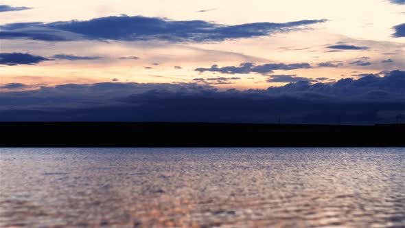 Windy Lake Waves At Sunset