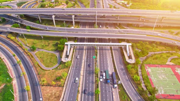 4K : Time lapse Aerial view and top view of traffic on city. Expressway with car lots