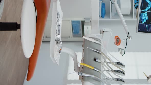 Vertical Video Interior of Modern Dental Office in Hospital with Dentistry Orthodontic Furniture