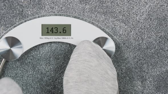 Inscription OMG on Bathroom Scales Digital Display