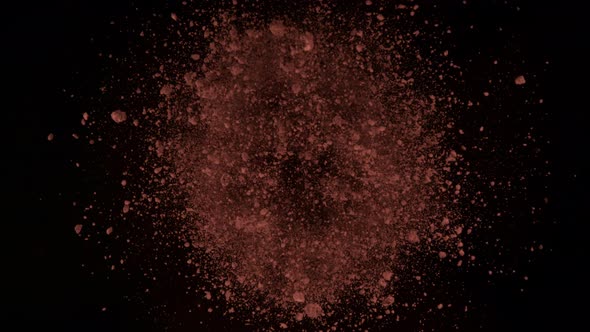 Super Slow Motion Shot of Rotating Cocoa Powder Explosion Towards Camera at 1000Fps