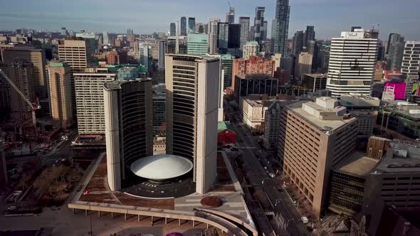 Aerial View of Toronto City Hall and Downtown Skyscrapers, Wide Dolly In