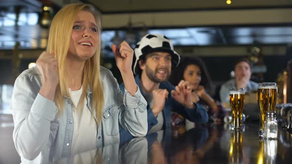 Football Fans Watching Game in Pub, Supporting National Team, Rejoicing Victory