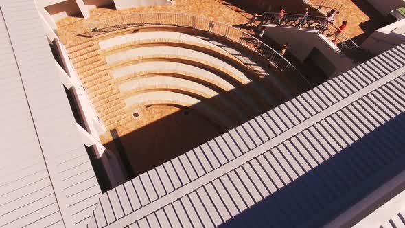 Aerial of kids entering the school campus